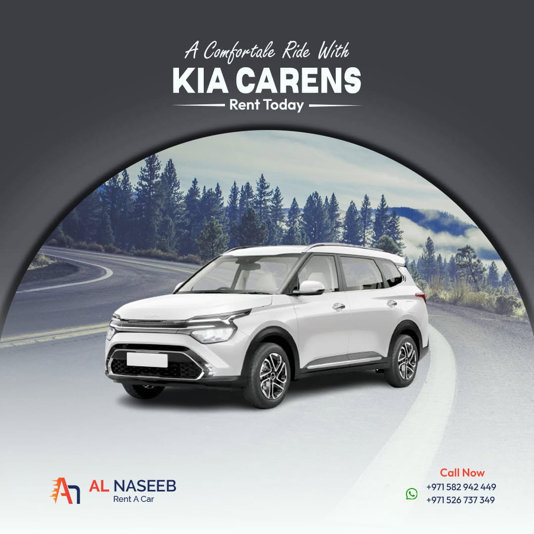White Kia Carens rental car